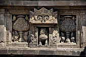 Prambanan - Candi Lara Jonggrang, kinara-kinari panels a composition of a lion with the tree of heaven and a pair of kinnara. 